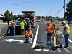 Pavement marking work being done on S Canal Blvd