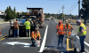 Pavement marking work being done on S Canal Blvd